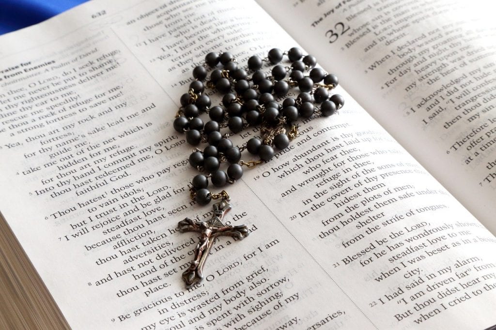 rosary, bible, cross
